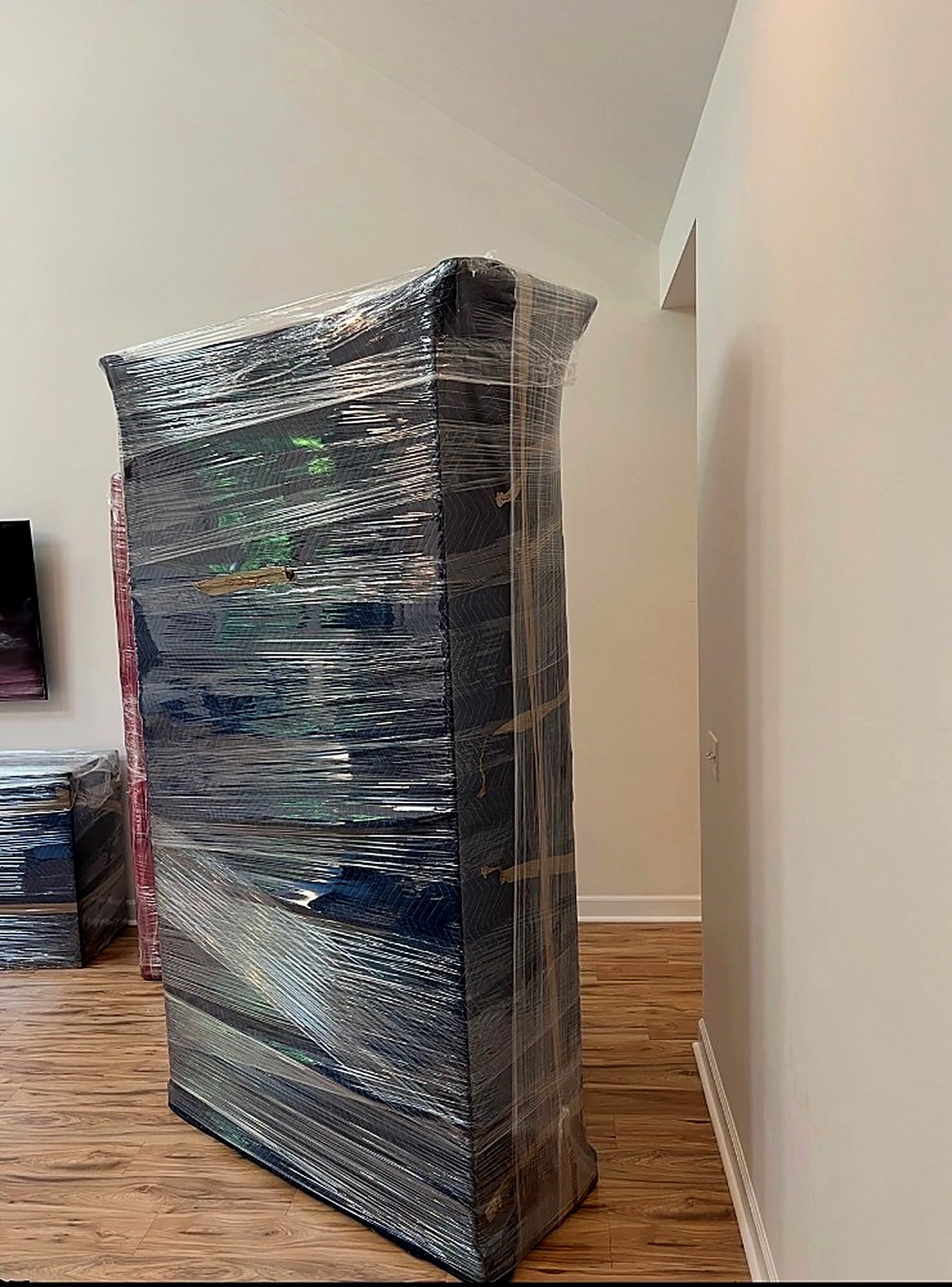 Dresser shrink-wrapped and padded by A2K movers